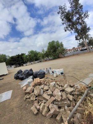 Junk removal job with debris ready for pickup