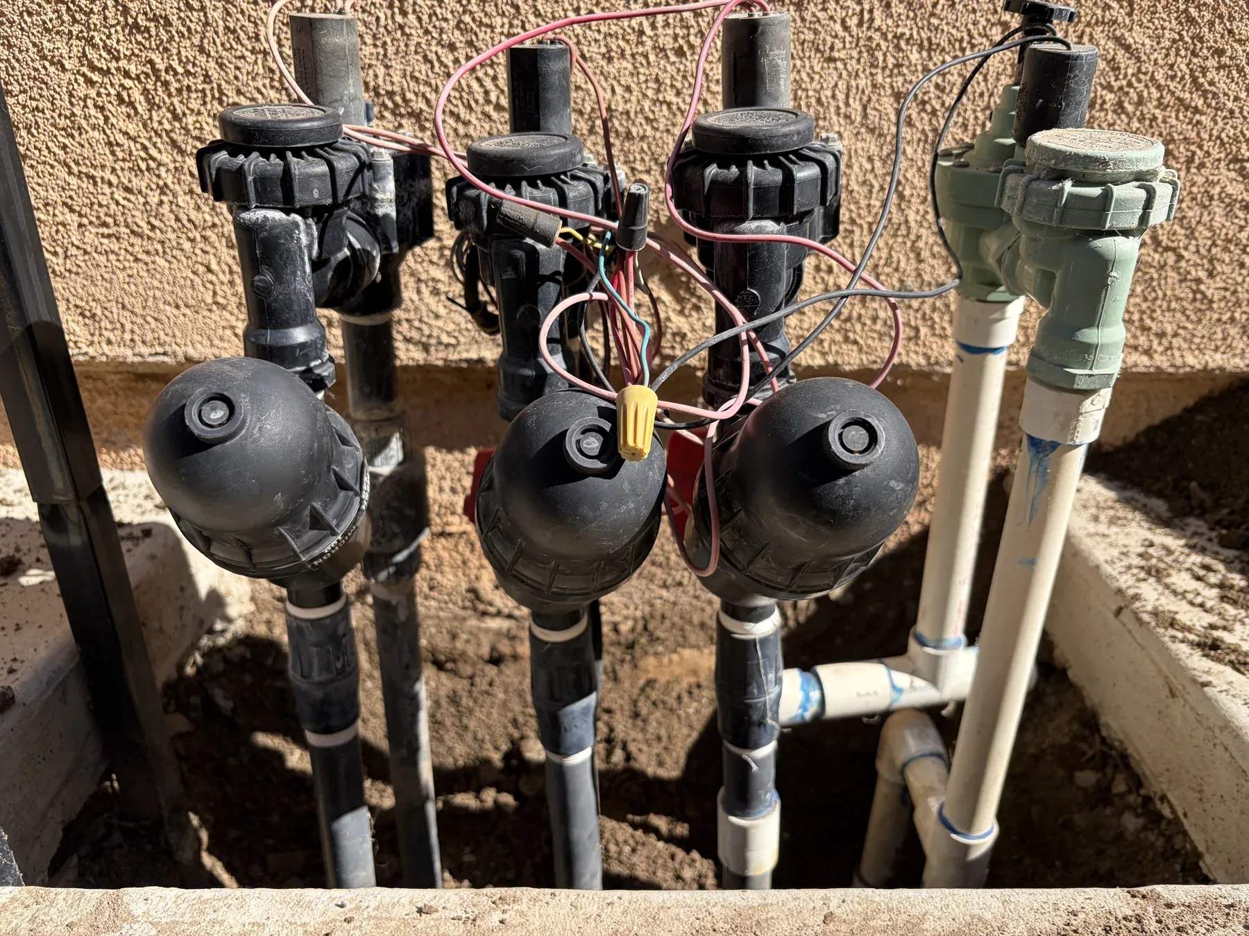 Irrigation valves and wiring during repair work in Menifee